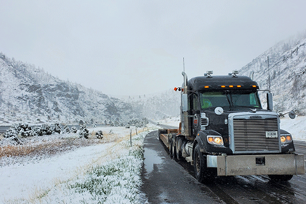 empty-lowboy-trailer